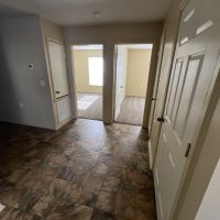 North Brook - hallway, looking in on bedrooms